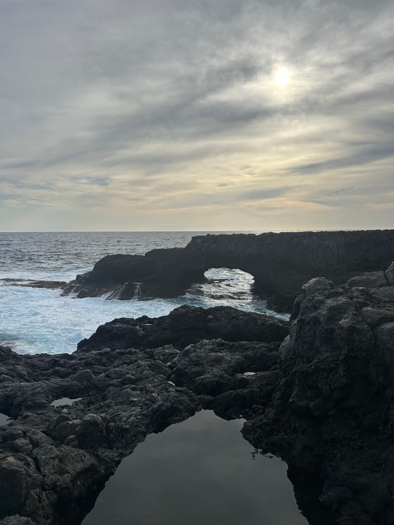 Lava arch over the sea