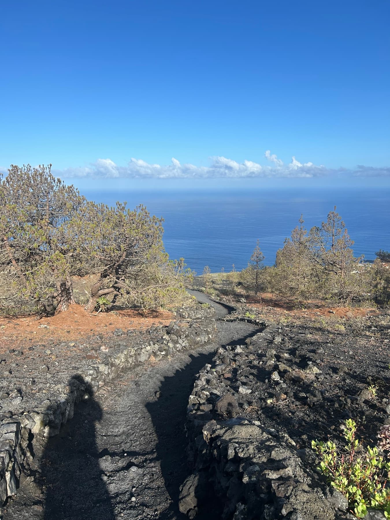 Volcanic path with the sea in the distance