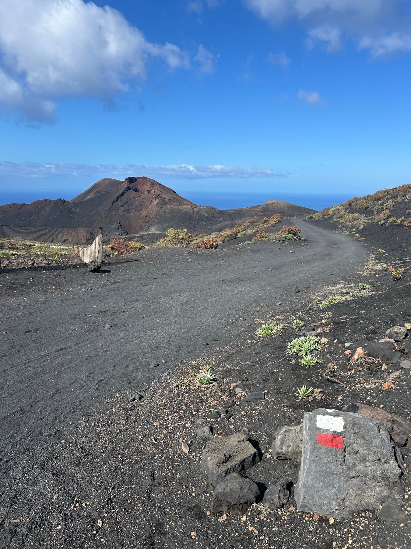 Black trail between volcanic cones