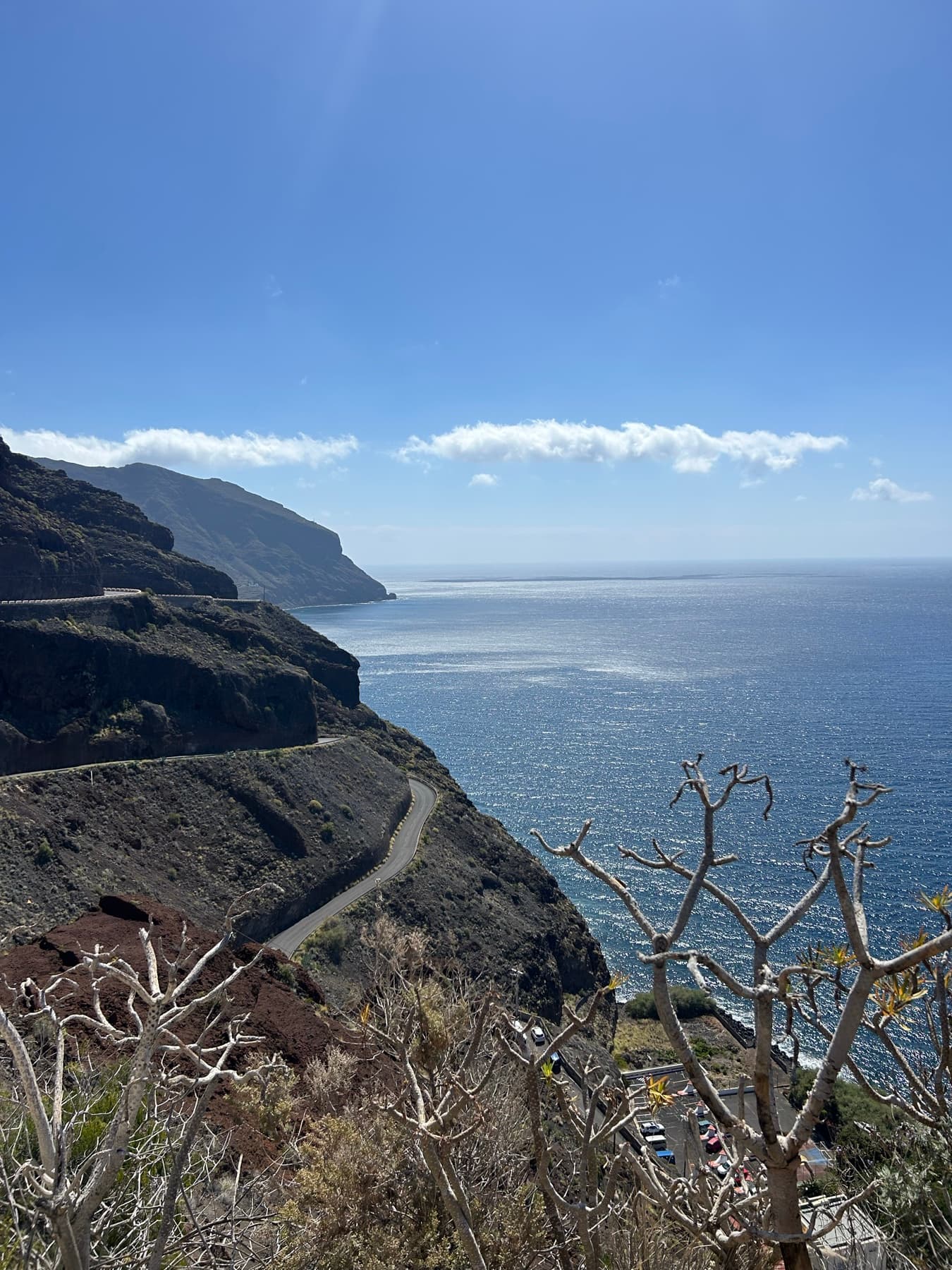 Road above cliffs beside the sea
