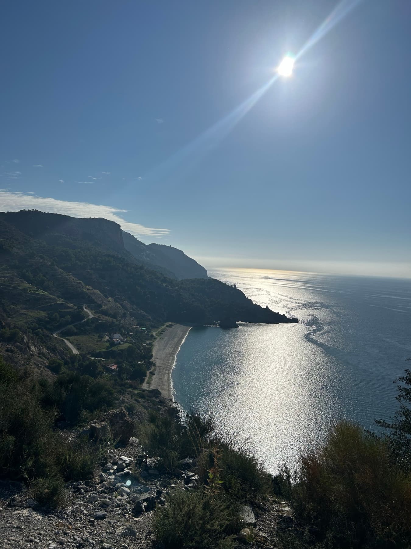 Mountain coast with evening light over the sea