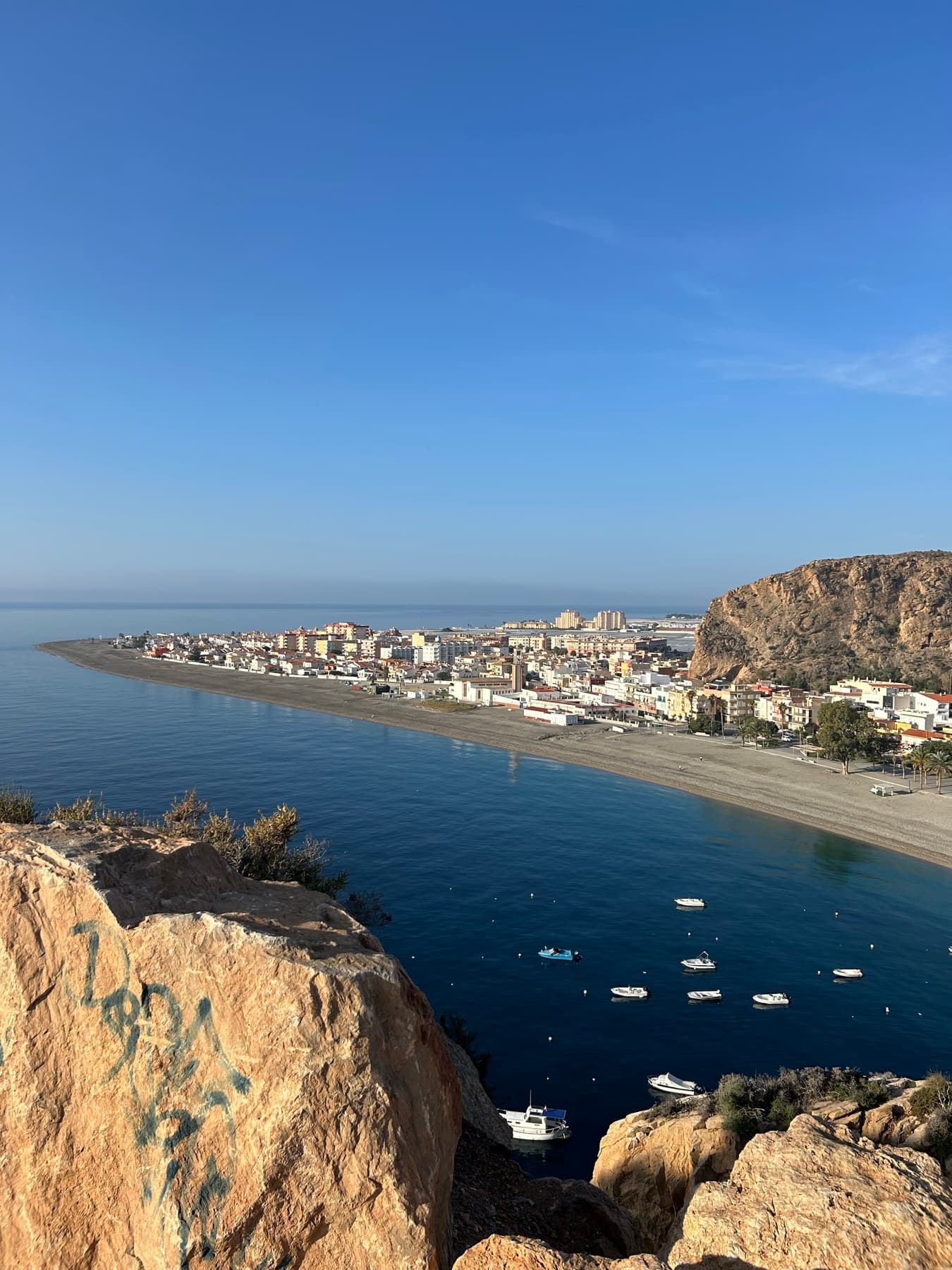 Coastal town between beach and cliff