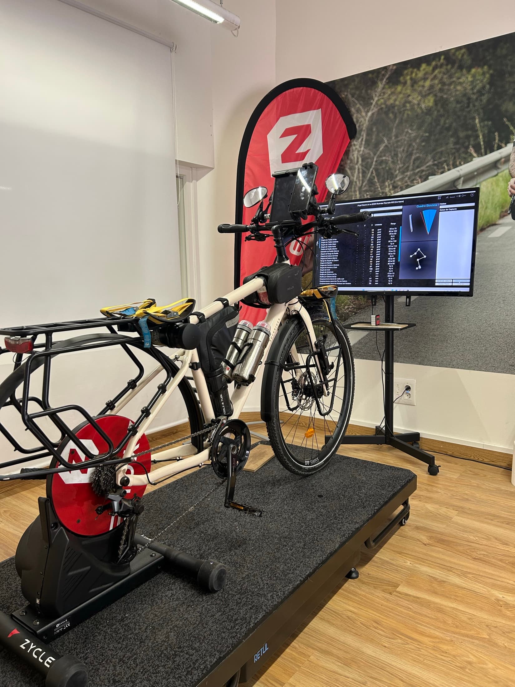Bicycle in a fitting studio with a measurement screen